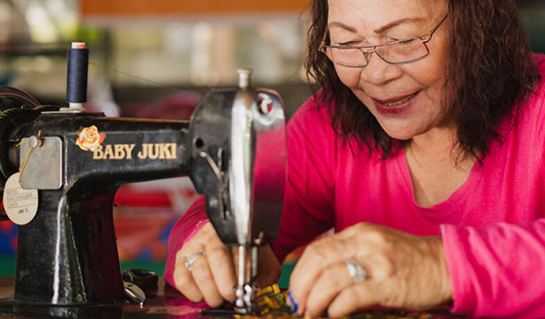 Philippino woman sewing