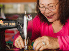 Philippino woman sewing
